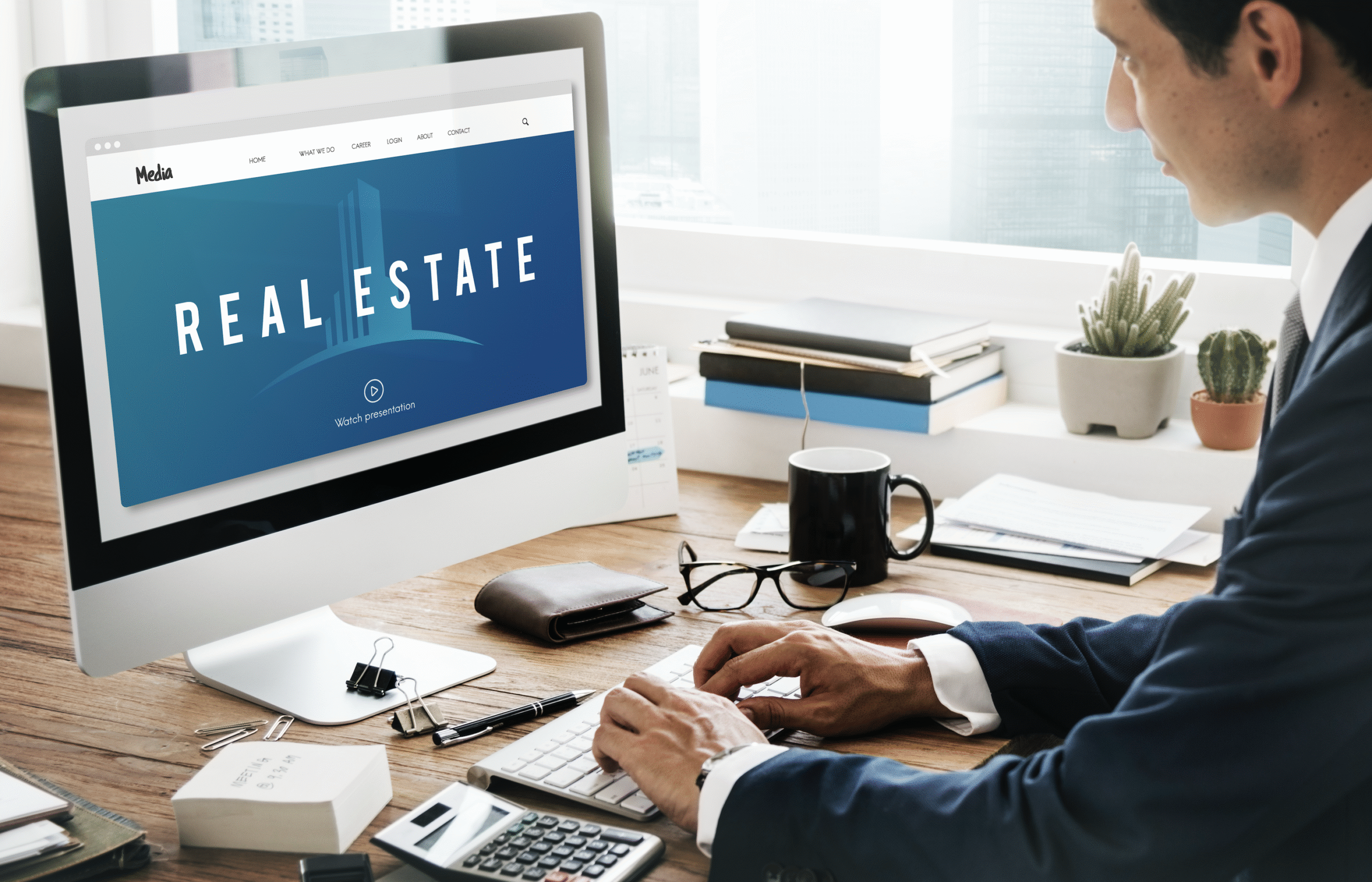 professional looking at a real estate website
